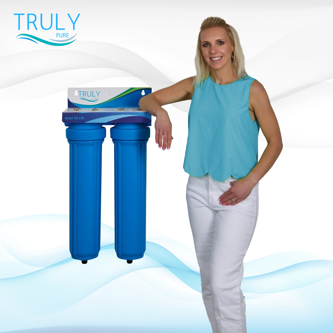 Pure 100 whole house filtration system with 5 micron sediment filter and 1 micron PFAS carbon filter for improved taste, clarity, and safety
